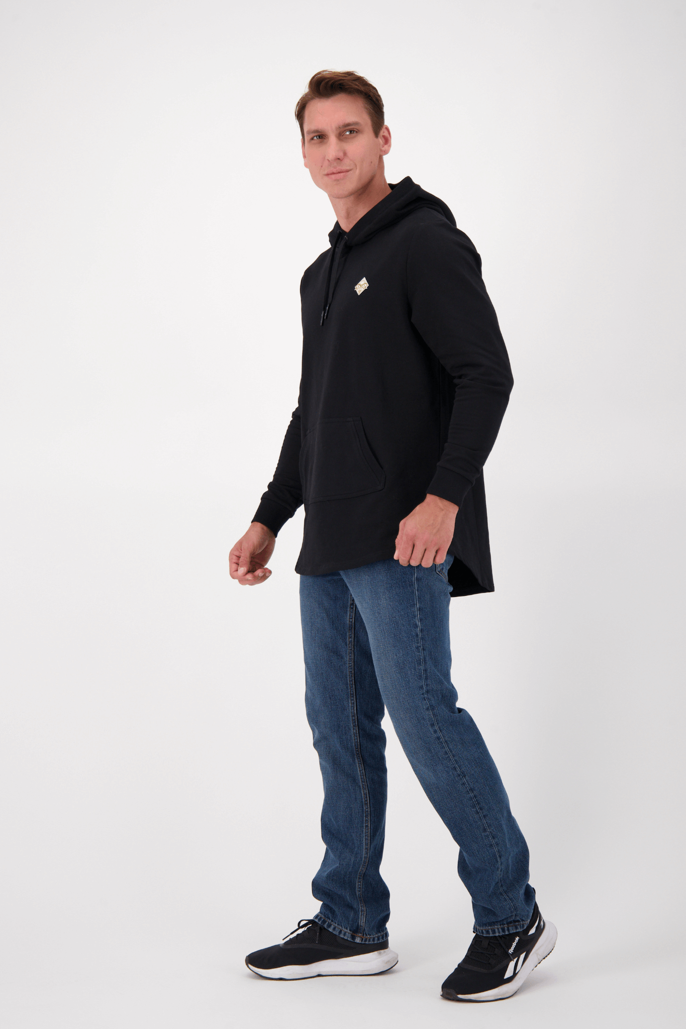 Empile Black Hoodie – side view on model, premium unisex streetwear