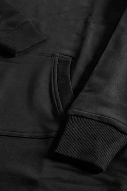Front details close up of the Empile black longline hoodie