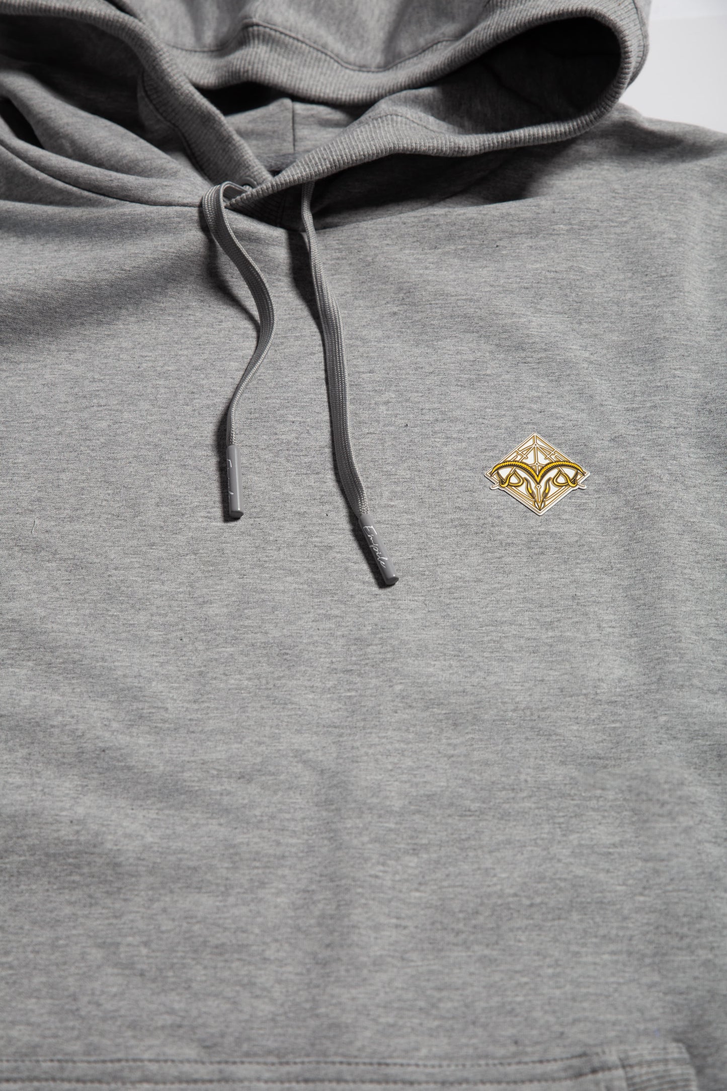 Front details close up of the Empile gray longline hoodie
