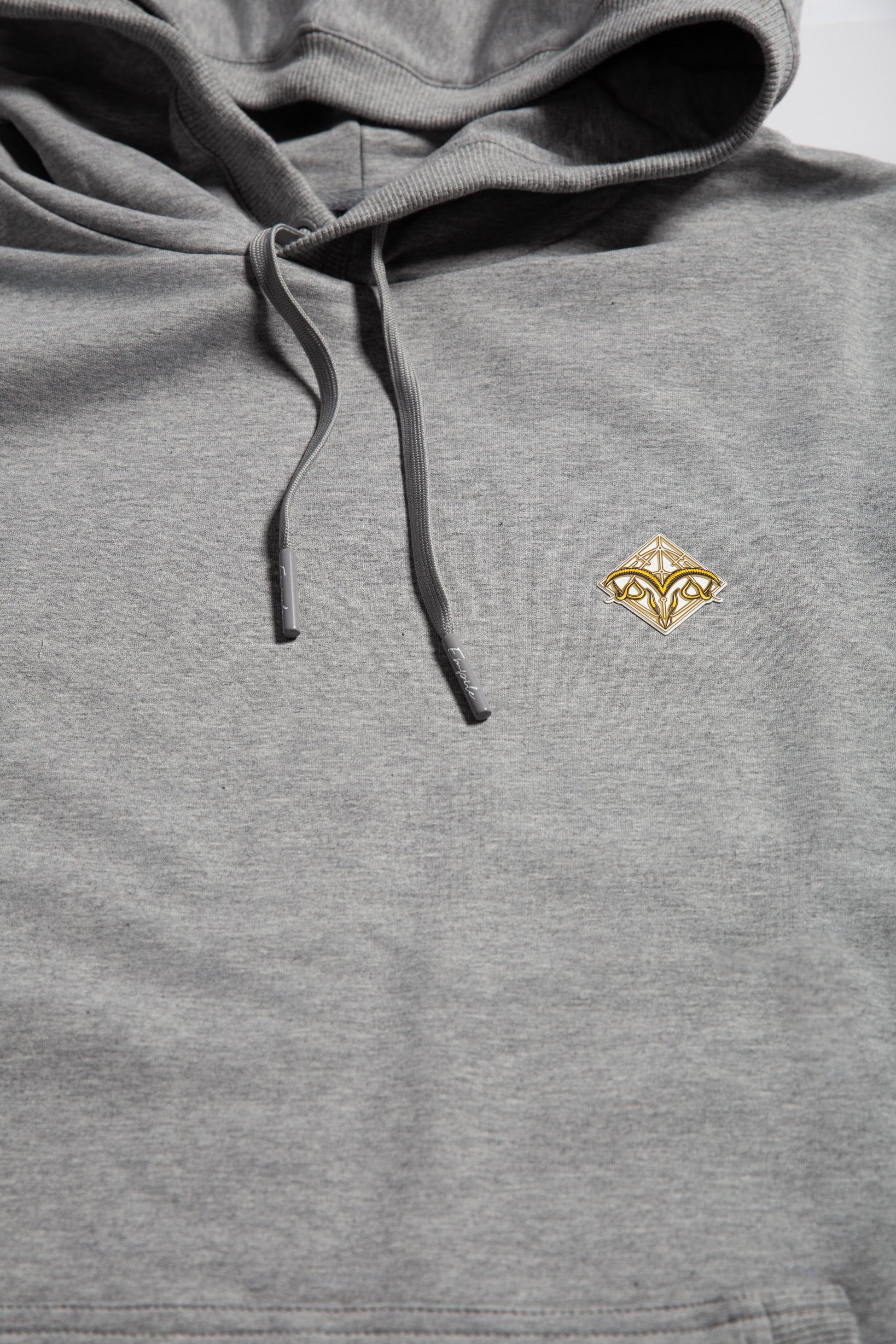 Front details close up of the Empile gray longline hoodie